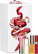 Парфумерія, косметика Набір - Clarins Christmas Beautiful Lips Collection (lip/oil/2.8ml + lipstick/1.5ml + lip/balm/5ml + lip/stain/2.8ml)