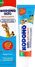 Зубная паста со вкусом апельсина для детей c 6 месяцев - Lion Kodomo Anti-Cavity Children's Toothpaste Orange — фото N2