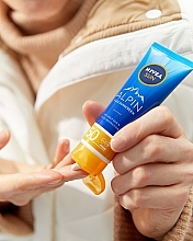 Сонцезахисний крем для обличчя SPF50 - NIVEA Sun Alpin Sun Cream for Face SPF 50+ — фото N9