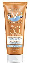 Духи, Парфюмерия, косметика Солнцезащитный водостойкий гель с технологией нанесения на влажную чувствительную кожу детей, SPF50+ - Vichy Capital Soleil Wet Skin Gel