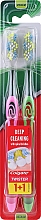 Духи, Парфюмерия, косметика Зубная щетка "Twister", средняя, салатовая + розовая - Colgate Twister Medium