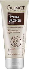 Духи, Парфюмерия, косметика Увлажняющее тонирующее молочко - Guinot Lait Hydra Bronze Moisturizing Body Lotion