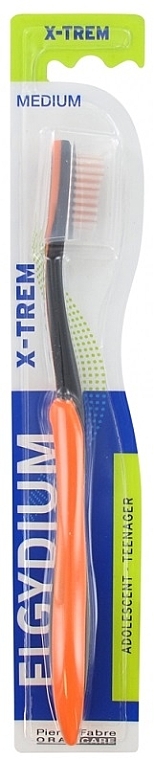 Зубна щітка для підлітків "X-Trem" середня, помаранчева - Elgydium X-Trem Medium Toothbrush — фото N1