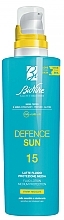 Парфумерія, косметика Сонцезахисний флюїд-лосьйон для тіла - BioNike Defence Sun SPF15 Fluid Lotion Water Resistant