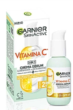 Парфумерія, косметика Освітлювальна сироватка-крем з вітаміном С - Garnier Skin Active Vitamin C 2-in-1 Serum Cream SPF25