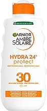 Парфумерія, косметика Сонцезахисне водостійке молочко проти сухості шкіри тіла та обличчя, високий ступінь захисту SPF30 - Garnier Ambre Solaire