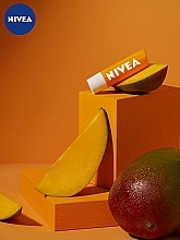 Бальзам для губ "Манго" - NIVEA Mango Shine Lip Balm — фото N4