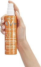 Солнцезащитный водостойкий спрей-флюид для чувствительной кожи детей, SPF50+ - Vichy Capital Soleil Kids Cell Protect Water Fluid Spray — фото N6