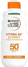 Солнцезащитное водостойкое молочко против сухости кожи и лица, очень высокая степень защиты SPF50+ - Garnier Ambre Solaire Protection Lotion SPF50+ — фото N1