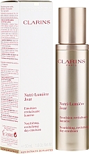 Духи, Парфюмерия, косметика УЦЕНКА Эмульсия для лица - Clarins Nutri-Lumière Jour Nourishing Rejuvenating Day Emulsion *