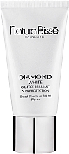 Освітлюючий захисний крем - Natura Bisse Diamond White SPF 50 +++ Oil Free Brilliant Protection — фото N5