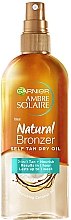 Парфумерія, косметика Суха олія для автозасмаги - Garnier Ambre Solaire Natural Bronzer Self Tan Dry Oil