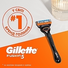 Бритва с 4 сменными картриджами, черная - Gillette Fusion5 Razor For Men — фото N9