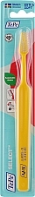 Зубна щітка, екстрам'яка, жовта - TePe Compact X-Soft Toothbrush — фото N1