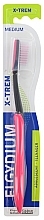 Зубна щітка для підлітків "X-Trem" середня, рожева - Elgydium X-Trem Medium Toothbrush — фото N1