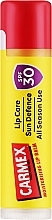 Парфумерія, косметика Бальзам для губ з тропічним ароматом - Carmex SPF30 Tropical Click Stick