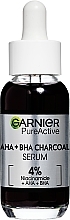 Сироватка-пілінг з вугіллям проти недоліків шкіри обличчя - Garnier Pure Active AHA+BHA Charcoal Serum — фото N1
