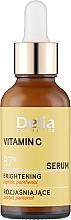Парфумерія, косметика Освітлювальна сироватка для обличчя, шиї та зони декольте, з вітаміном С - Delia Vitamin C Serum