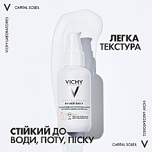 Сонцезахисний невагомий флюїд проти ознак фотостаріння шкіри обличчя, SPF 50+ - Vichy Capital Soleil UV-Age Daily — фото N6