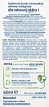 Сонцезахисний флюїд для обличчя - NIVEA Sun Triple Protect Dry Touch Fluid SPF50 — фото N2