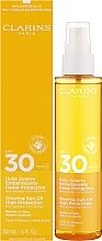 Солнцезащитное масло для тела - Clarins Glowing Sun Oil High Protection SPF 30 — фото N2