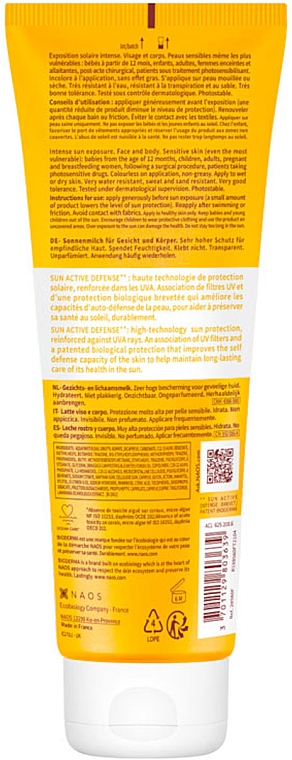 Ультразволожувальний лосьйон для обличчя й тіла - Bioderma Photoderm Lait Ultra Moisturising Lotion Sensitive Skin SPF 50+ — фото N2