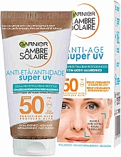 Солнцезащитный крем с гиалуроновой кислотой - Garnier Ambre Solaire Anti-Age Super UV SPF50 — фото N1