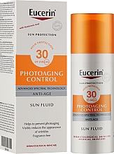 Флюид антивозрастной солнцезащитый - Eucerin Sun Protection Photoaging Control Sun Fluid SPF 30 — фото N2