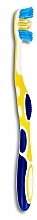 Зубна щітка, середньої жорсткості, жовта із синім - Wellbee — фото N1