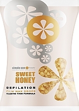 Воск для депиляции пленочный в гранулах "Сладкий мед" - Simple Use Beauty Depilation Film Wax Drops Sweet Honey — фото N1