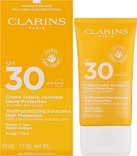 Сонцезахисний крем від зморшок - Clarins Youth-Protecting Sunscreen SPF 30 — фото N2