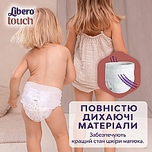 Підгузки-трусики дитячі Touch Pants 5 (10-14 кг), 64 шт. (2х32) - Libero — фото N6