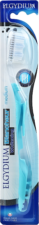 Зубная щетка отбеливающая, средней жесткости, прозрачно-голубая - Elgydium Whitening Medium — фото N1