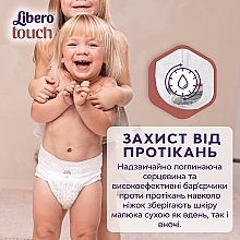 Підгузки-трусики дитячі Touch Pants 5 (10-14 кг), 64 шт. (2х32) - Libero — фото N5