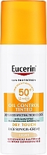 Парфумерія, косметика Сонцезахисний гель-крем для обличчя - Eucerin Oil Control Dry Touch Tinted Sun Gel-Cream Light SPF50+