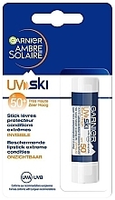 Парфумерія, косметика Захисний бальзам для губ SPF 50 - Garnier Ambre Solaire UV SKI Lip Balm