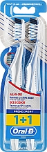 Набор зубных щеток "Экстра чистка. Все в одном", 40 средней жесткости, серая + синяя - Oral-B Pro Expert CrossAction All in One — фото N1