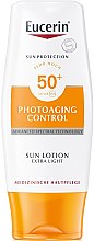 Лосьон солнцезащитый ультралегкий - Eucerin Photoaging Control Sun Lotion Extra Light SPF50+ — фото N1