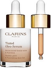 Парфумерія, косметика Відтінкова сироватка для обличчя - Clarins Tinted Oleo-Serum Healthy-Glow And Nourishing Skin Tint