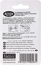Міжзубна нитка з м'ятою і фтором - Beauty Formulas Active Oral Care Dental Floss Mint Waxed + Fluor 100m — фото N2