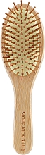 Овальна бамбукова щіточка для розчісування волосся - The Body Shop Oval Bamboo Pin Hairbrush — фото N1