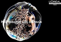 Професійна олійка для зменшення ламкості та небажаної зміни кольору - L'Oreal Professionnel Serie Expert Metal Detox Oil — фото N1
