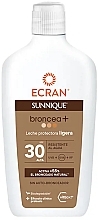 Солнцезащитное молочко для тела - Ecran Sunnique Broncea+ SPF30 — фото N1