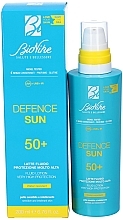 Солнцезащитный флюид-лосьон для тела - BioNike Defence Sun SPF50+ Fluid Lotion Water Resistant — фото N2