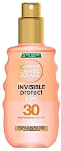 Сонцезахисний водостійкий спрей для шкіри тіла та обличчя "Невидимий Захист", високий ступінь захисту SPF30 - Garnier Ambre Solaire Invisible Protect Glow SPF30 Spray — фото N1
