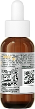 Нічна сироватка з вітаміном С для зменшення видимості пігментних плям, зморшок та вирівнювання тону шкіри обличчя - Garnier Skin Active Vitamin C Night Serum — фото N2