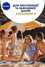 Сонцезахисний спрей "Захист та зволоження" SPF 30 - NIVEA SUN Protect & Moisture — фото N4