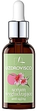 Безолійна антивікова сироватка для обличчя з екстрактом ехінацеї - Uzdrovisco Anti-Aging Smoothing Face Serum — фото N1