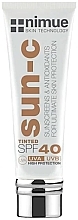 Духи, Парфюмерия, косметика Солнцезащитный тональный крем SPF 40 - Nimue Skin Technology Sun-C Tinted 