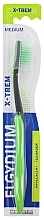 Зубна щітка для підлітків "X-Trem" середня, зелена - Elgydium X-Trem Medium Toothbrush — фото N1